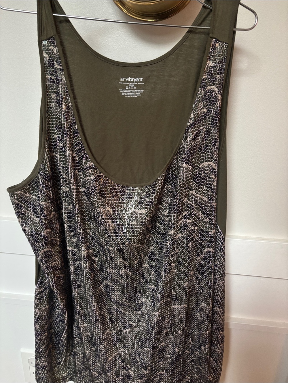 Lane Bryant sequin tank top, styled in an olive green or camouflage-patterned